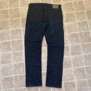 AG jeans - the graduate tailored leg dark denim - 33W